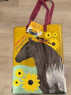 Trader Joe’s Maryland horse in the front and crab and boots on the back